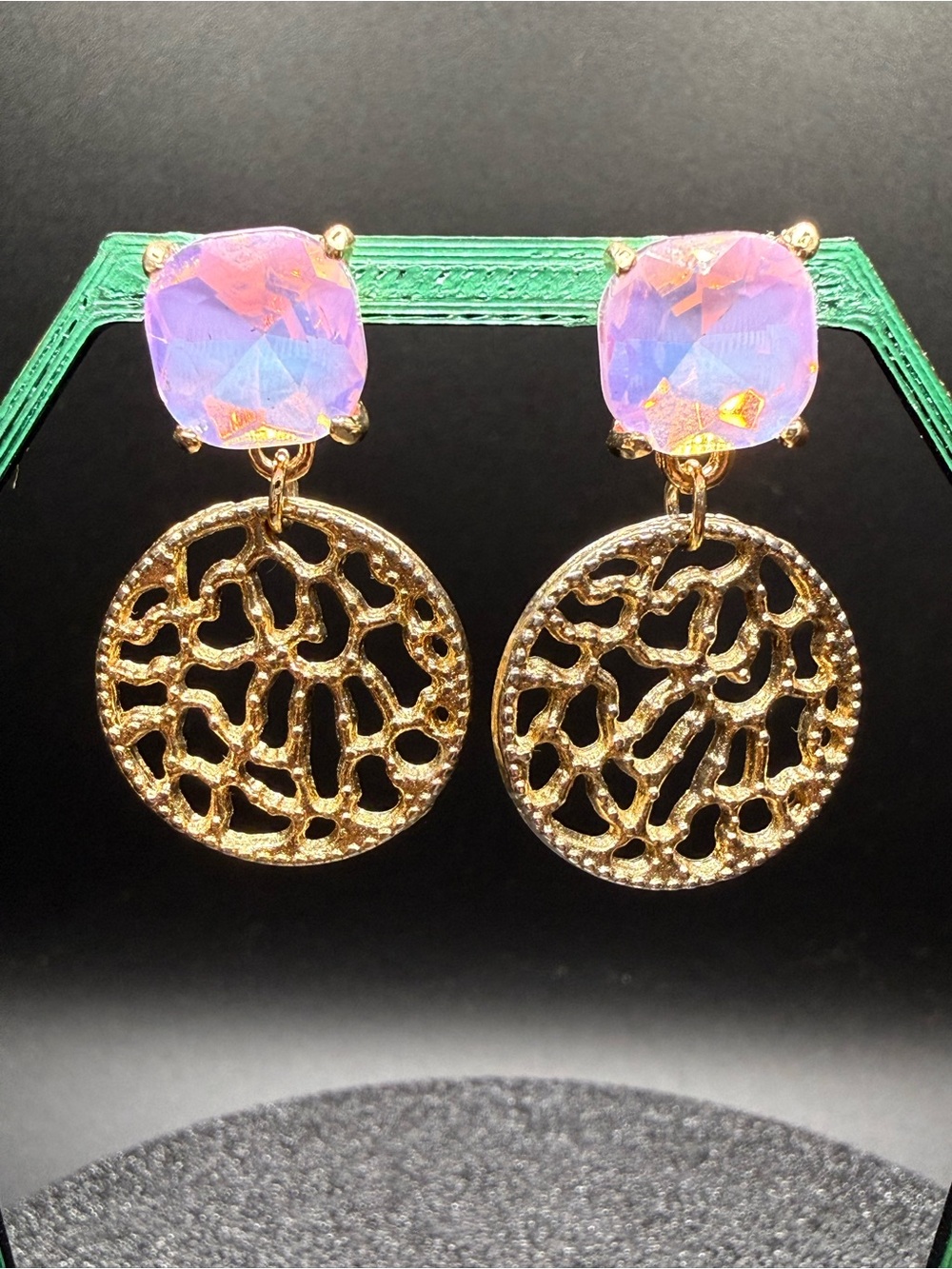 Cushion cut lavender iridescent stud crystal with a gold abstract disc earrings.